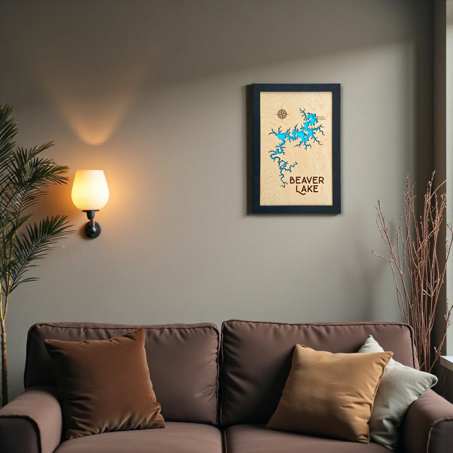 Beaver Lake wooden map wall art displayed in a cozy living room with warm lighting, handcrafted lake decor by The Curious Bison.