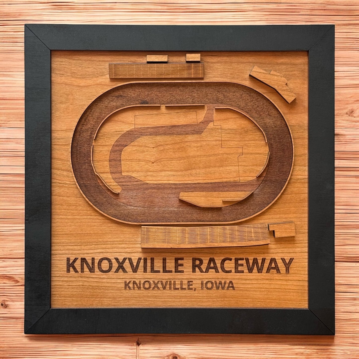Knoxville Raceway 3D track map wall art in a black frame, ideal for motorsports lovers. A unique handcrafted piece celebrating the legendary Iowa racetrack.