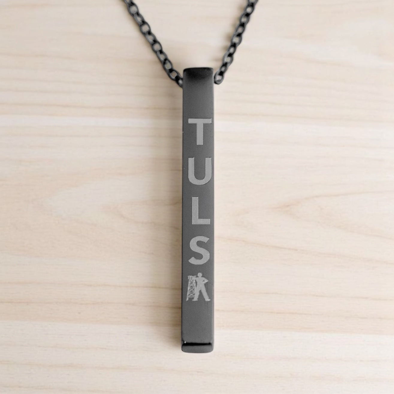 Matte black bar necklace with vertical TULSA engraving and Tulsa Driller, bold Oklahoma jewelry