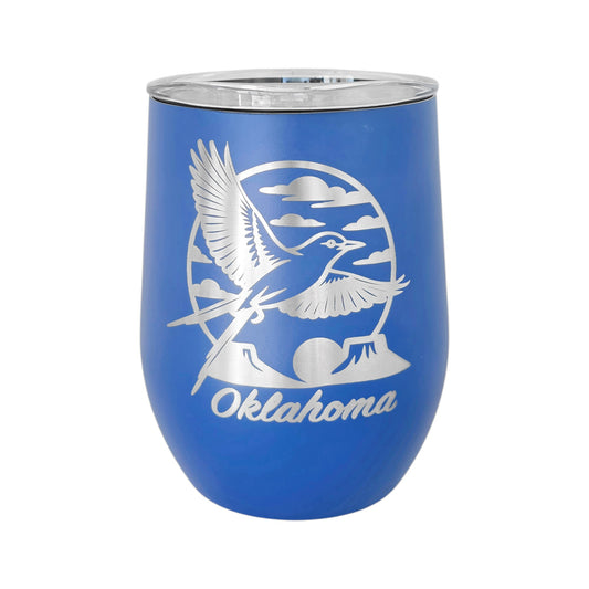 Blue 12oz wine tumbler with an etched Oklahoma scissortail flycatcher design on double-wall insulated stainless steel with a clear lid. This Oklahoma wine tumbler is commonly purchased as a souvenir or gift and works well for wine, cocktails, and everyday drinks.