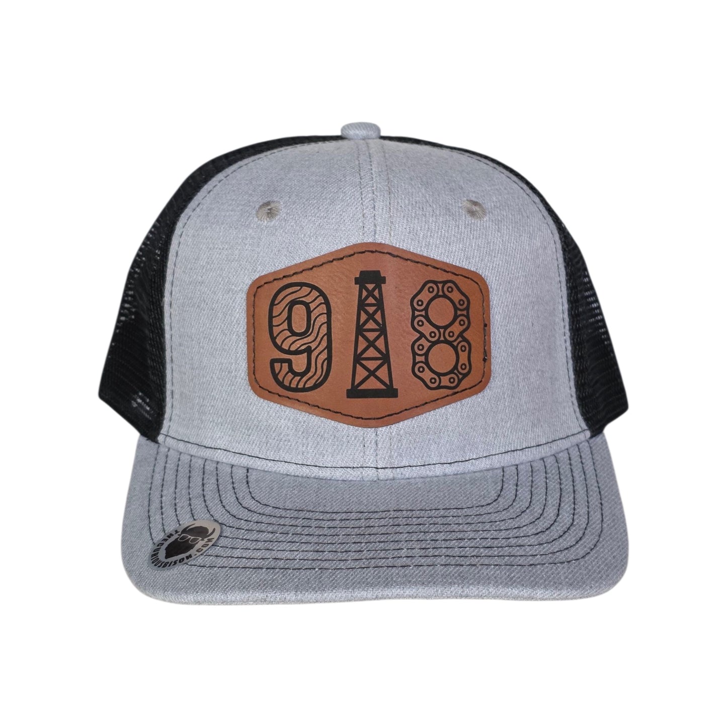 Front view of 918 Tulsa oil derrick trucker hat with laser engraved leatherette patch featuring area code and oil derrick design