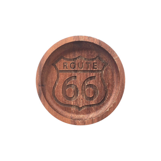 Front view of circular walnut Route 66 catch-all tray on white background.