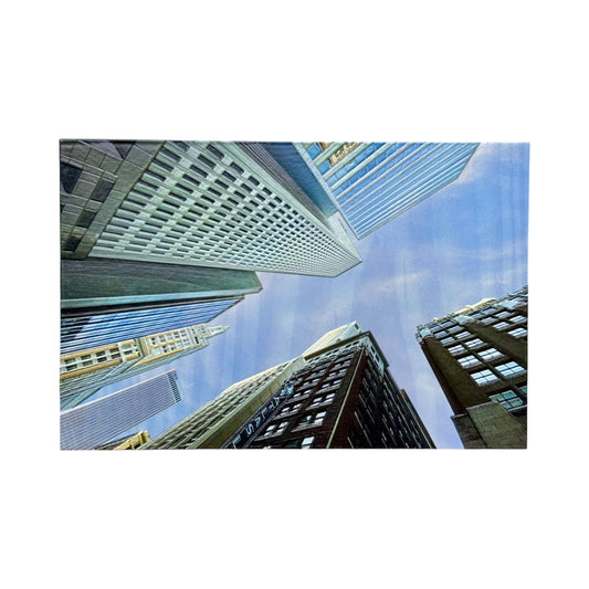 Flat overhead image of a 5x7 wood photo block featuring Tulsa skyscrapers viewed from below against a blue sky with detailed textures and strong perspective