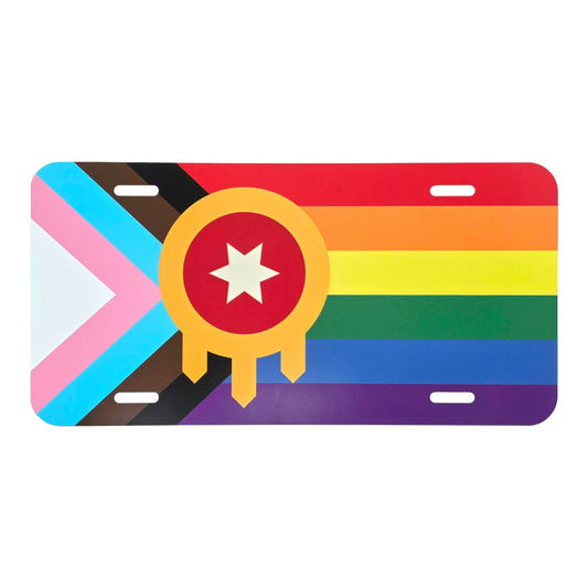 Inclusive Tulsa flag vanity license plate featuring the Progress Pride colors and Tulsa emblem on a white background.