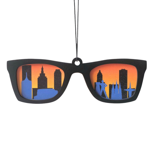 Wooden sunglasses ornament with Tulsa skyline design