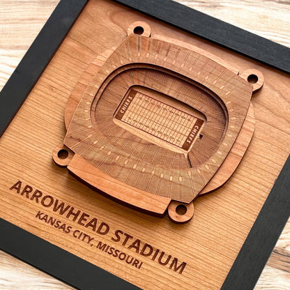 Close up of layered wooden Arrowhead Stadium art showing detailed seating and field engravings