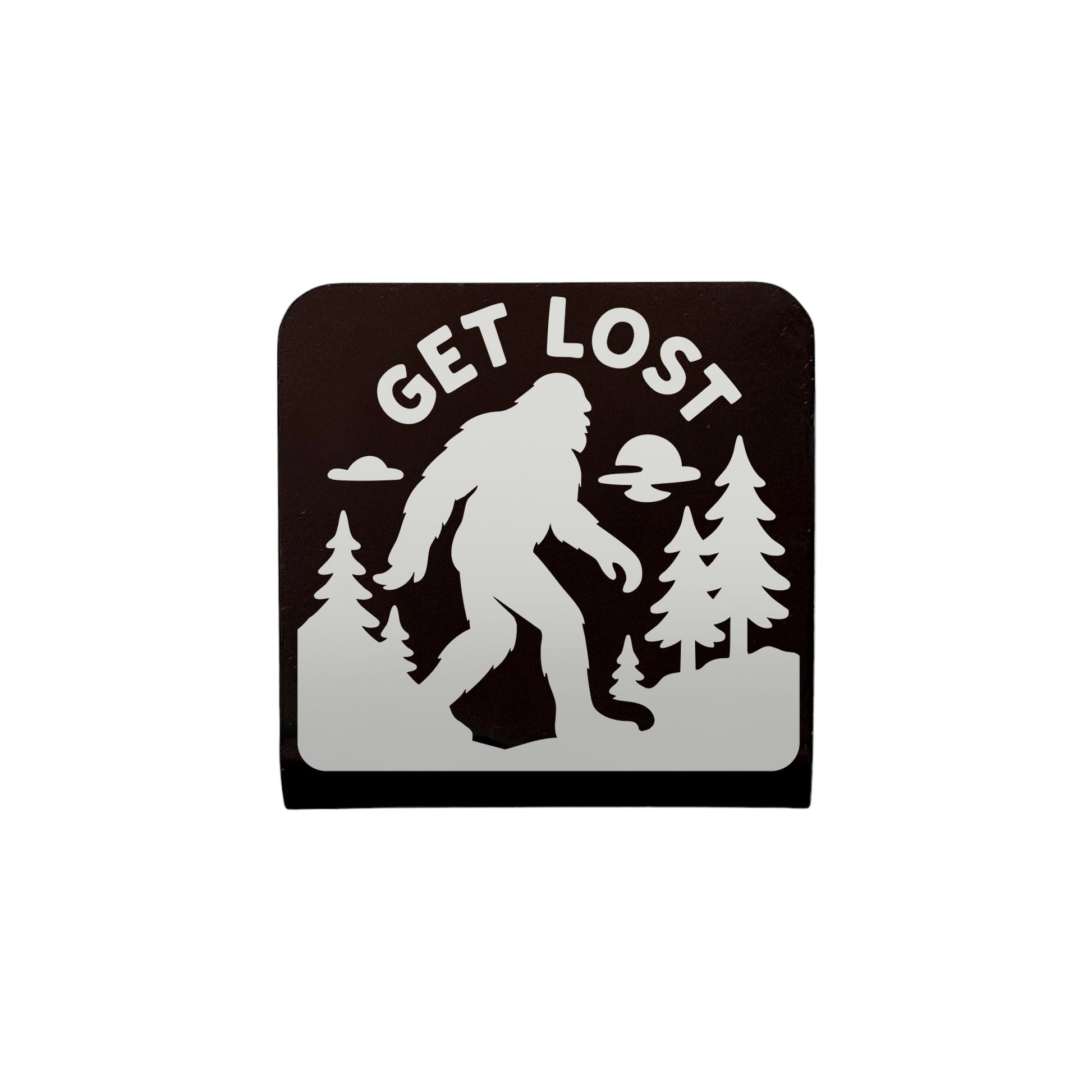 Bigfoot “Get Lost” metal hat clip with laser-cut Sasquatch design and forest background, handcrafted adventure accessory by The Curious Bison.