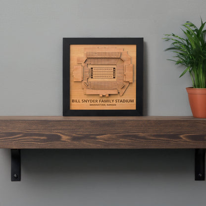 Bill Snyder Family Stadium wooden stadium map displayed on shelf in black frame, Kansas State stadium wall decor made from layered wood