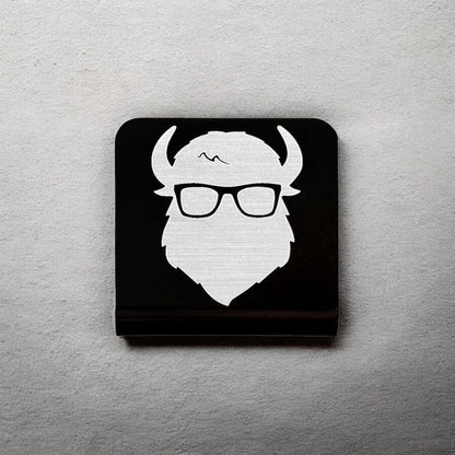 Square aluminum hat clip with Bison logo displayed against a neutral background showing brushed silver design and clean edges