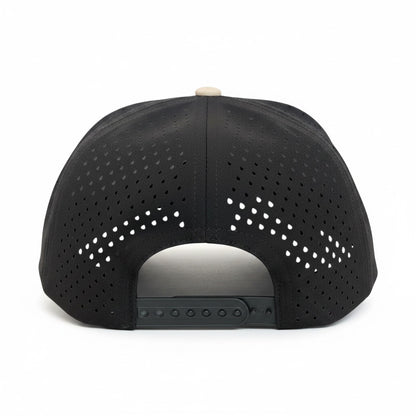 Rear view of black bison performance golf hat showing breathable laser-perforated side and back panels with adjustable snapback closure
