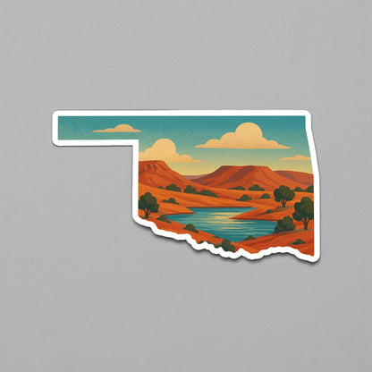 Die cut Oklahoma state Black Mesa Lake sticker displayed on a neutral wall surface, scenic western Oklahoma desert landscape with mesas and lake inside state shape
