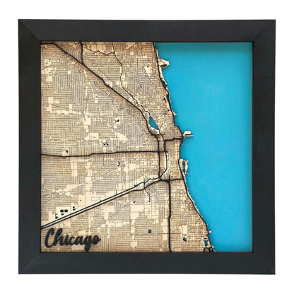 full view of Chicago Illinois layered wood map wall art with Lake Michigan in blue and detailed street layout in black frame city decor
