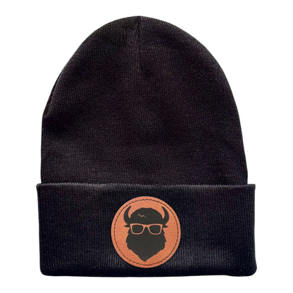 Black knit beanie with Curious Bison leatherette patch featuring bison logo, unisex winter hat for Tulsa Oklahoma souvenir or everyday wear