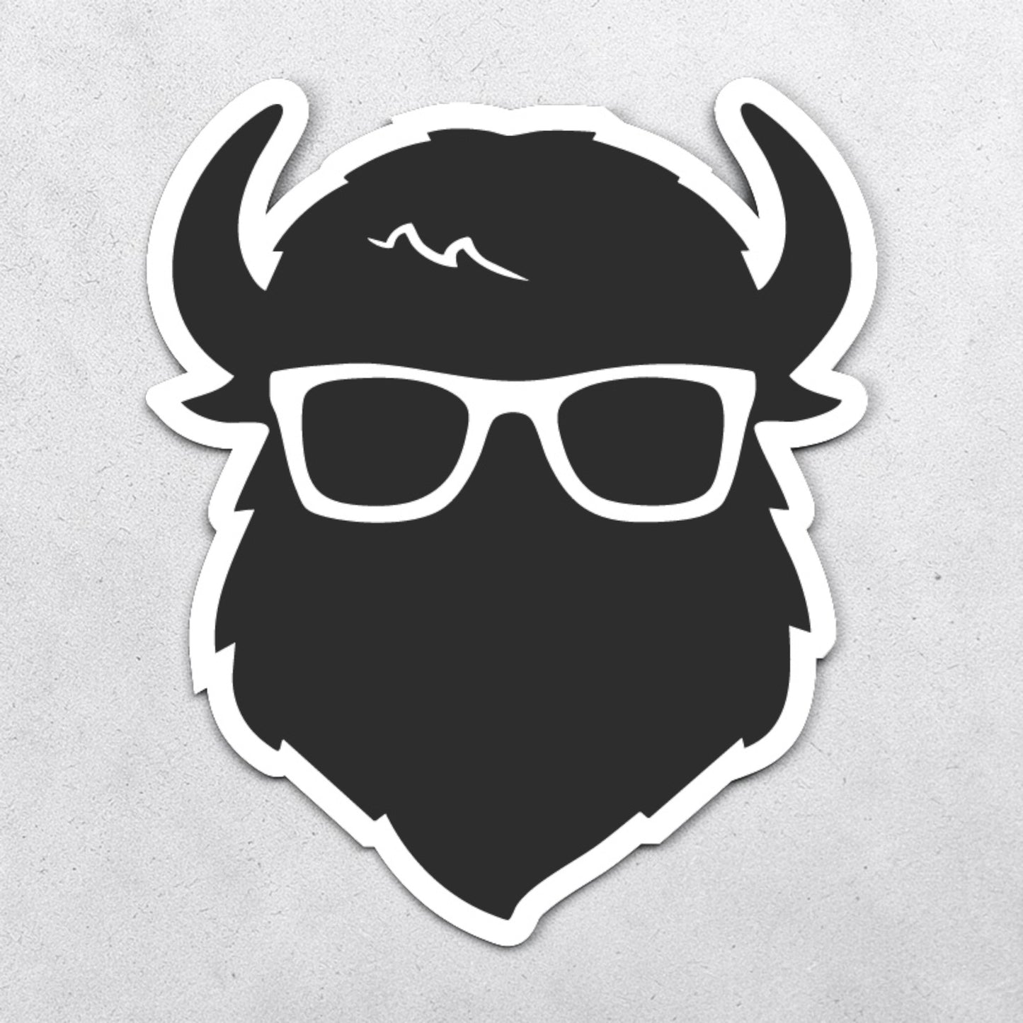 Curious Bison logo vinyl sticker featuring black bison head with glasses and white border, minimalist small business mascot decal