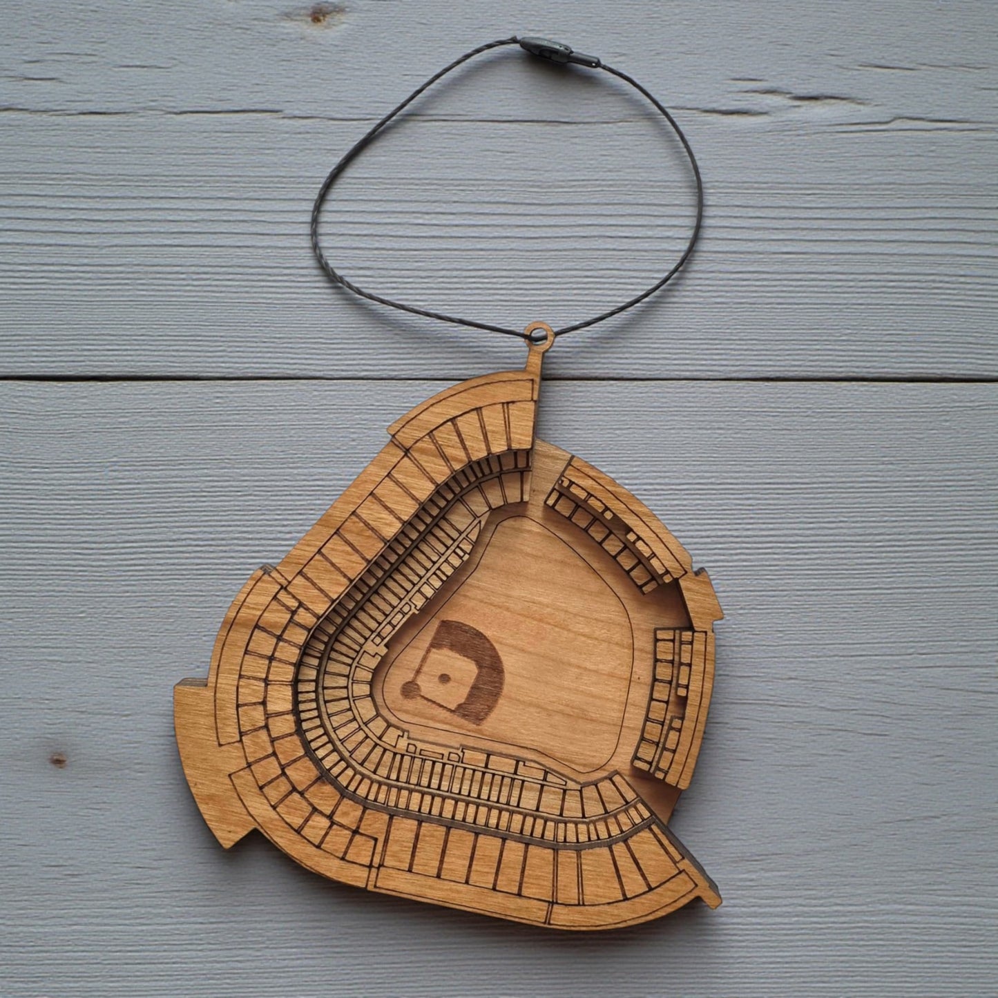 Flat lay of Dodger Stadium wooden ornament with engraved seating and field layout, baseball stadium ornament made from wood for MLB fan decor