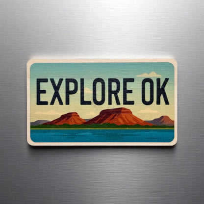 Explore Oklahoma wooden magnet displayed on a metal surface, license plate style Oklahoma magnet with scenic landscape design