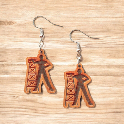 Golden Driller wooden earrings showing laser cut Tulsa landmark design with oil derrick silhouette, lightweight hypoallergenic wood earrings for Tulsa souvenir or Oklahoma gift