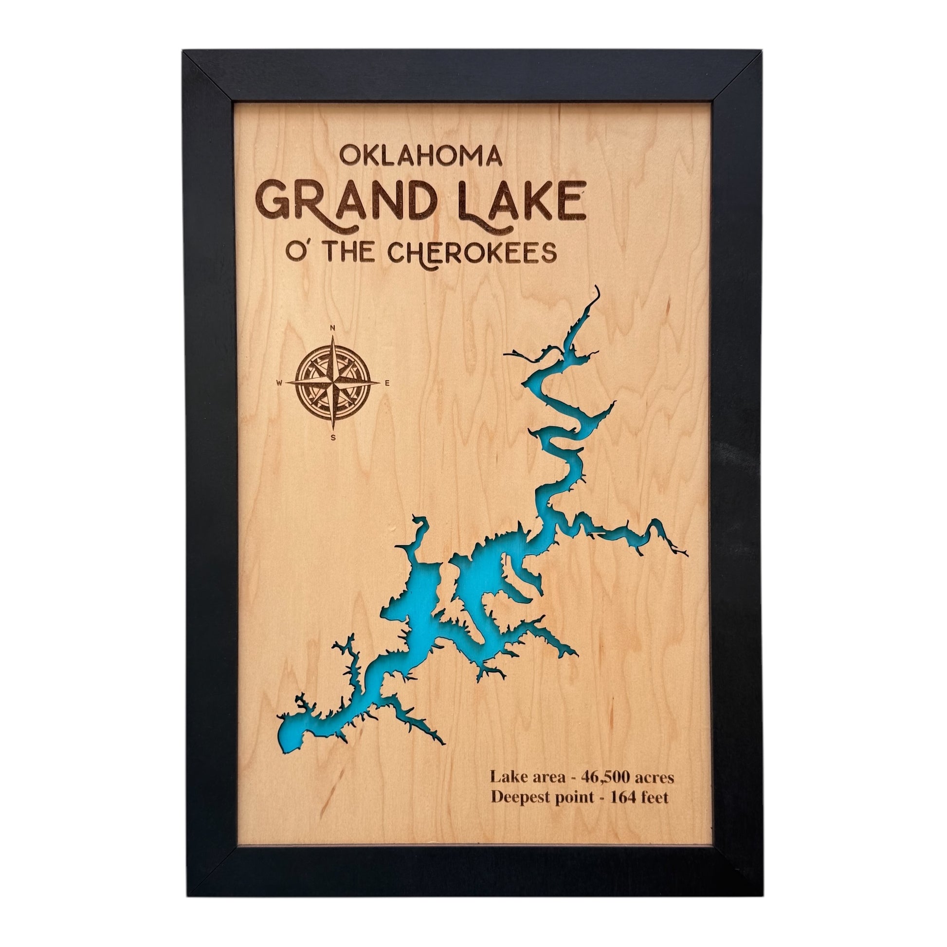 Wooden map of Grand Lake O’ the Cherokees in Oklahoma, featuring a laser-cut lake design with blue water details and compass engraving
