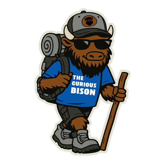 Kerf the Curious Bison hiking mascot vinyl sticker wearing sunglasses backpack and hiking boots holding a walking stick outdoor adventure character decal