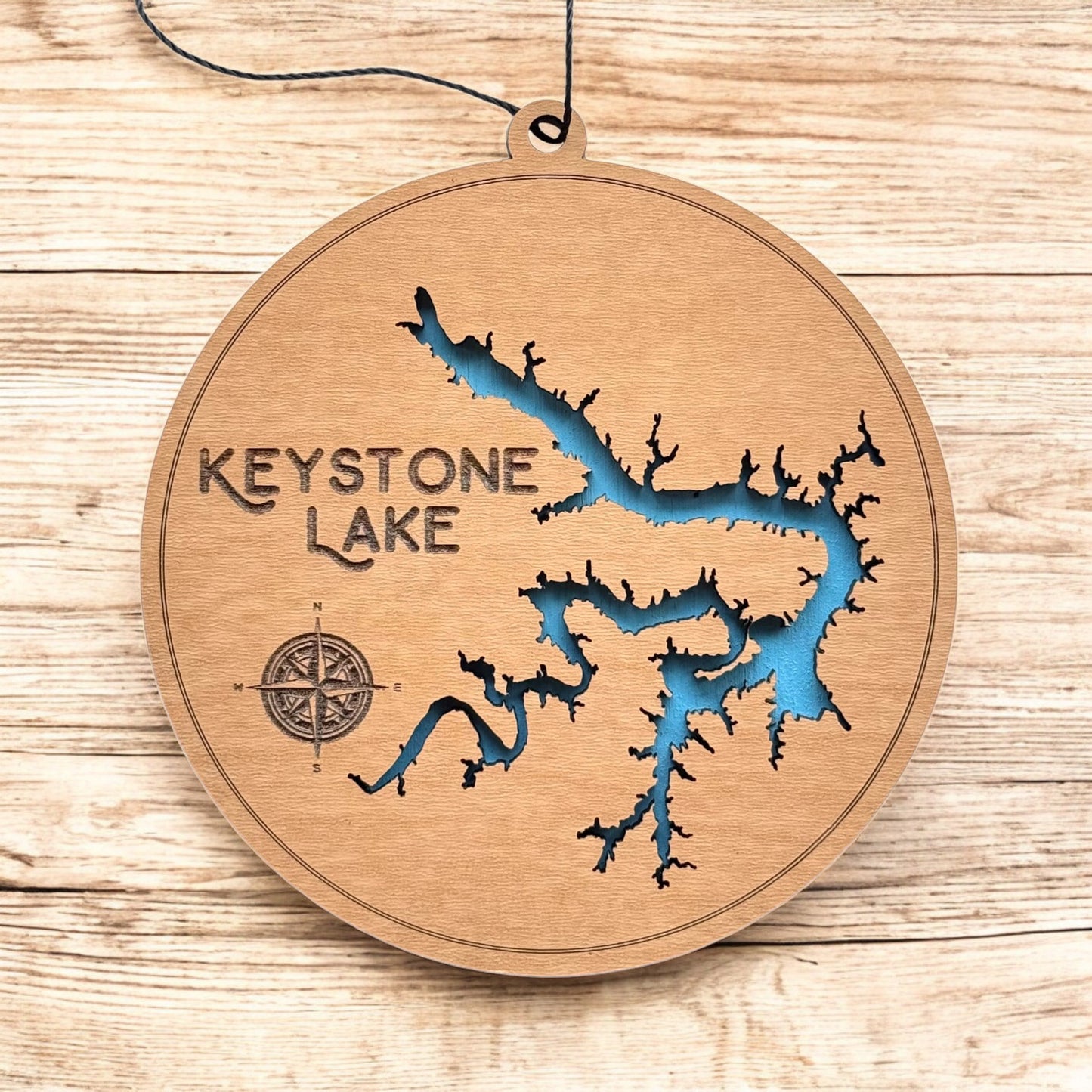 Keystone Lake wooden ornament hanging by black cord, two layer wood lake map ornament with painted blue water