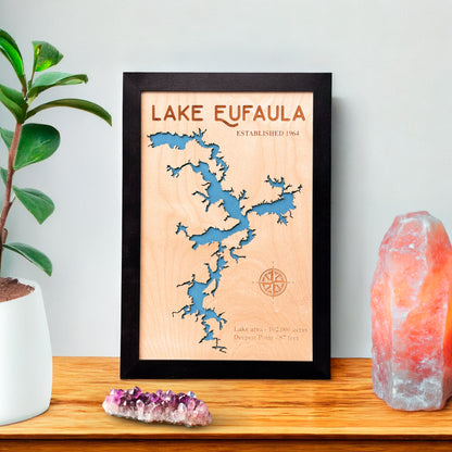 Lake Eufaula framed wooden map displayed on shelf with decor, laser cut lake map wall art for cabin or lake house