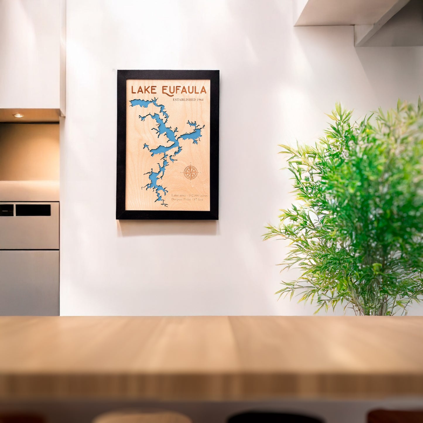 Lake Eufaula wooden map wall art hanging on wall in black frame, laser cut lake map decor for Oklahoma home