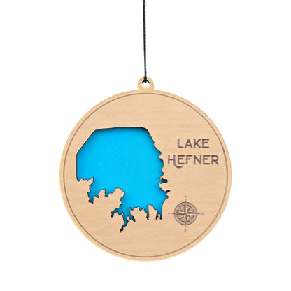 Lake Hefner wooden ornament showing laser cut Oklahoma lake map with blue layered water detail, engraved Lake Hefner text and compass, wood lake ornament for Oklahoma City gift or souvenir
