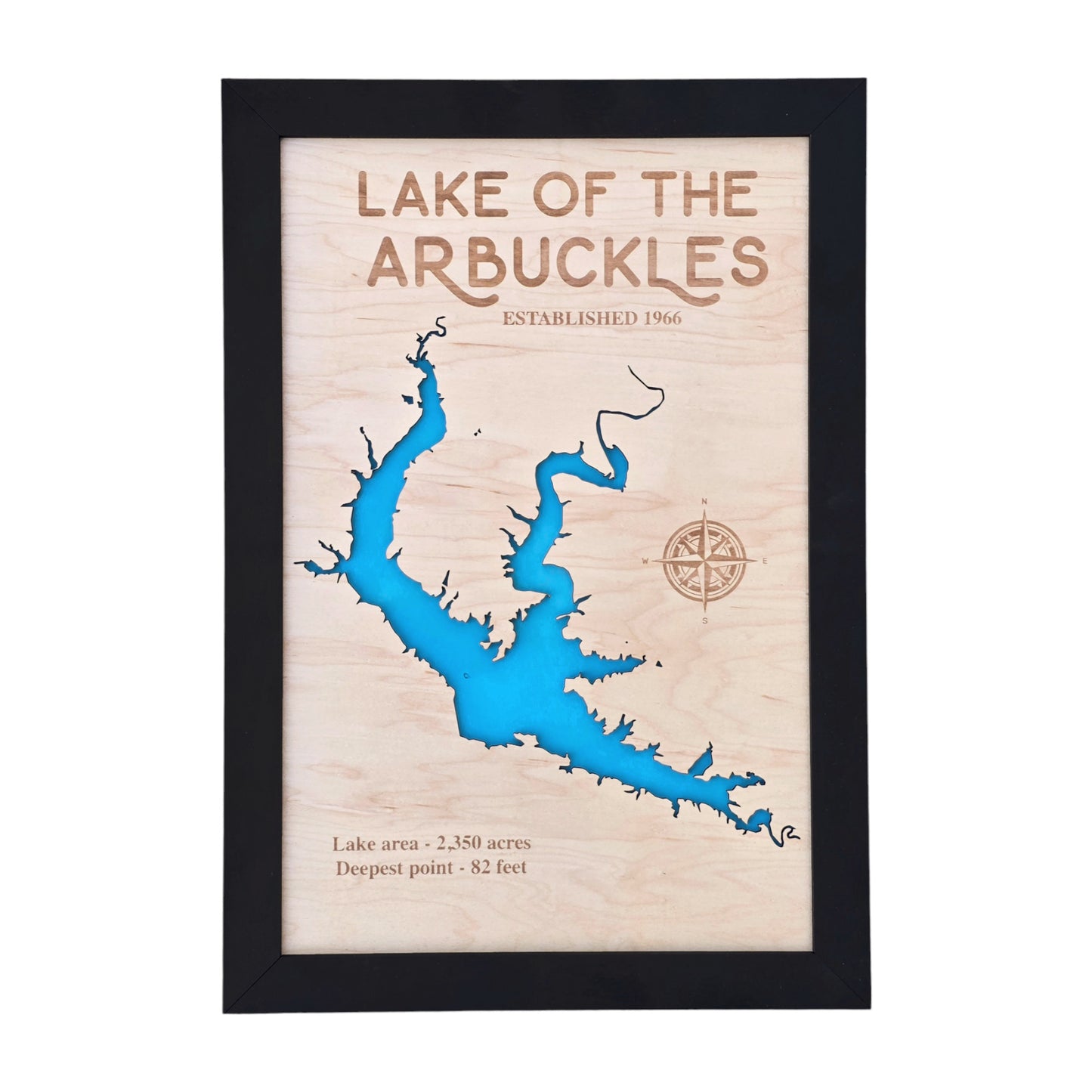 Lake of the Arbuckles wooden map wall art in black frame showing lake outline cut into natural wood with blue water layer, Oklahoma lake decor ready to hang