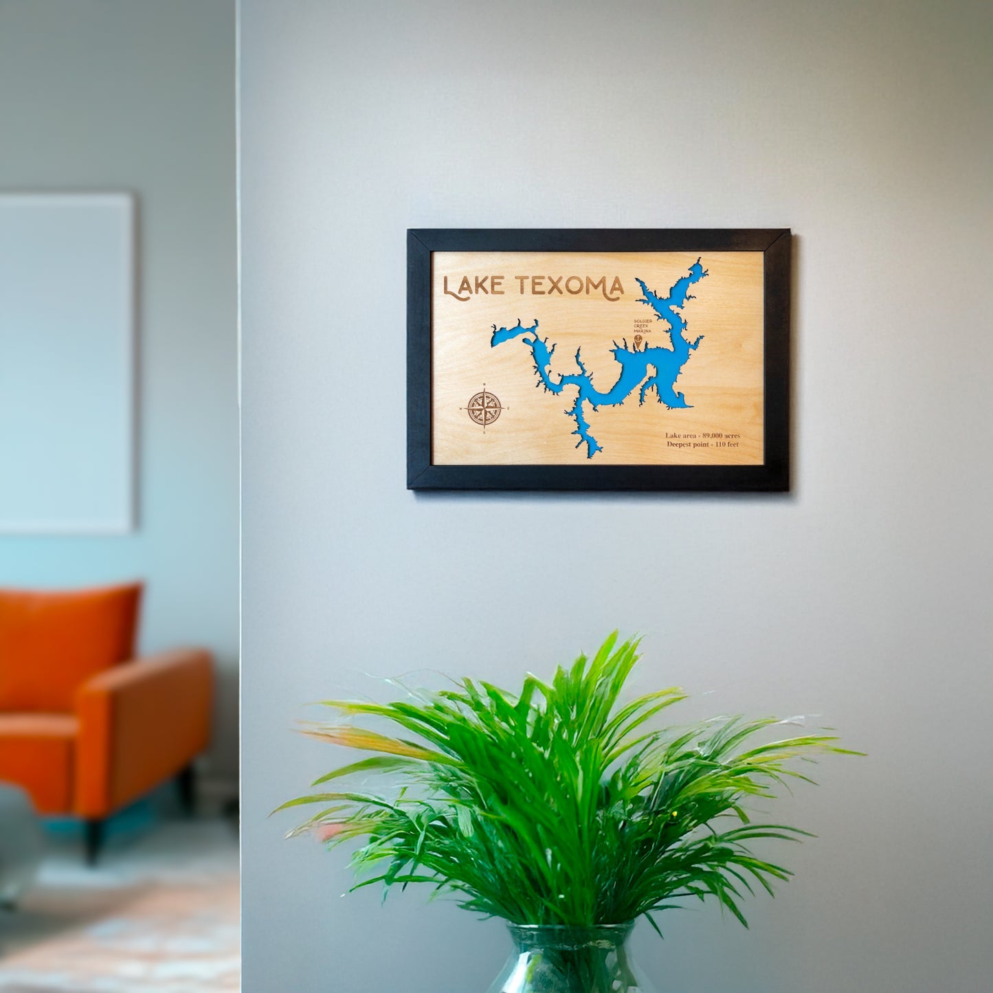 Lake Texoma framed wooden map displayed on a wall in a modern living space