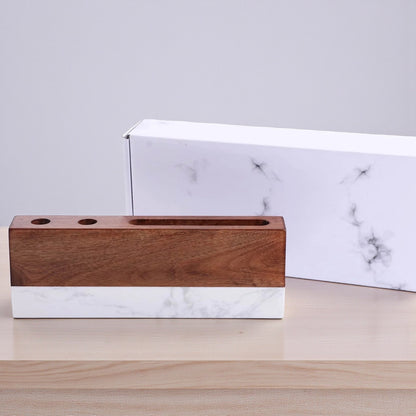 Marble desk name plate with acacia wood top displayed in front of white marble style gift box packaging, professional engraved office name plate gift