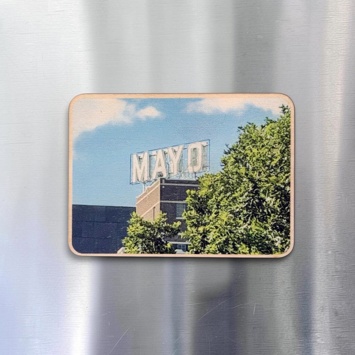 Mayo Hotel Tulsa wooden magnet displayed on a stainless steel refrigerator, featuring an original color photograph of the historic MAYO rooftop sign in downtown Tulsa Oklahoma
