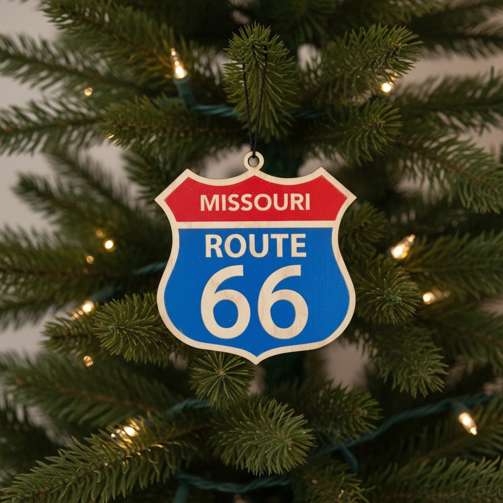 Missouri Route 66 wooden ornament hanging on a Christmas tree with warm lights, vintage highway sign holiday ornament for Route 66 travelers and souvenir collectors