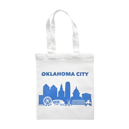 Oklahoma City blue small tote bag with skyline design featuring Skydance Bridge, Wheeler Ferris Wheel, and State Capitol, handmade Oklahoma souvenir.