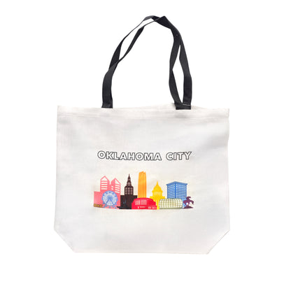 Oklahoma City pride skyline tote bag with colorful LGBTQIA+ inclusive skyline graphic, reusable OKC tote with black handles