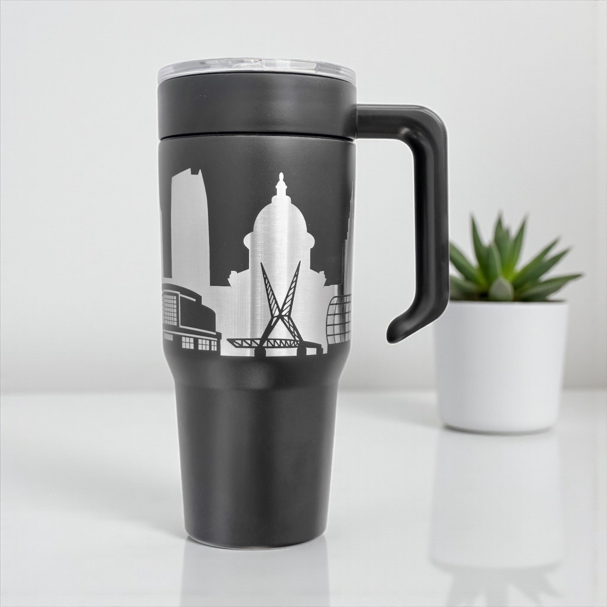 Black Oklahoma City Skyline 30oz handle tumbler with engraved stainless design, handcrafted OKC travel mug by The Curious Bison.