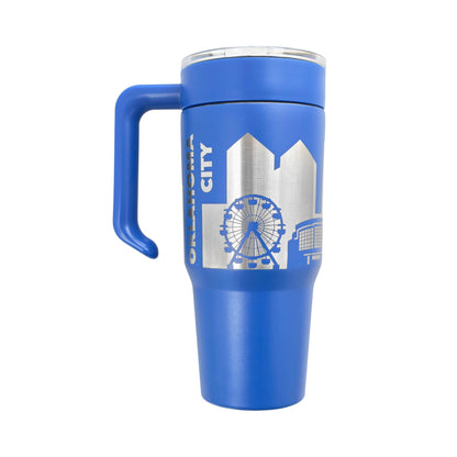 Blue Oklahoma City skyline 30oz tumbler with handle showing engraved stainless steel city skyline design, reusable travel cup with lid and straw
