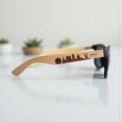 Oklahoma City skyline wooden sunglasses with laser-engraved OKC landmarks on bamboo arms, handcrafted souvenir by The Curious Bison.
