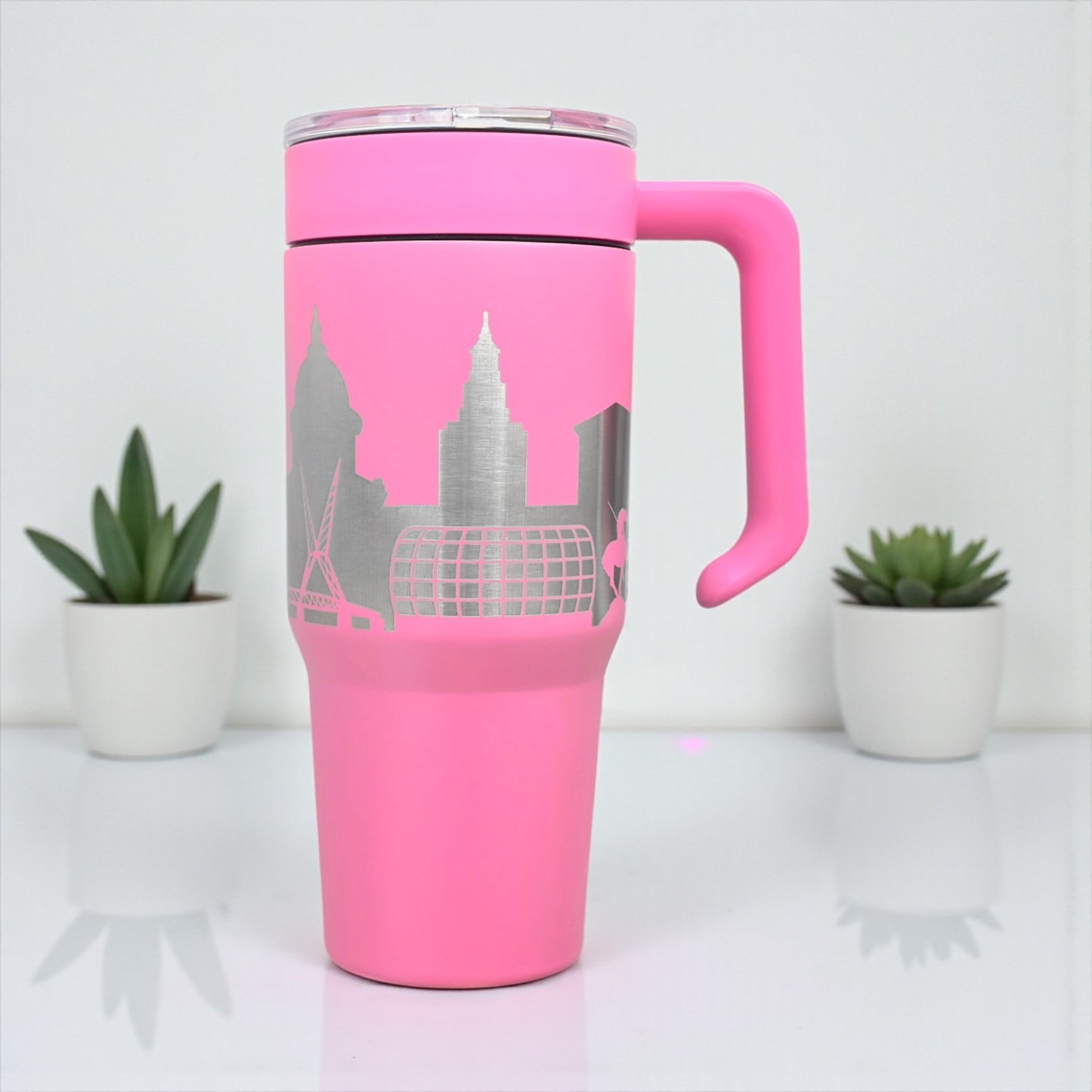 Pink Oklahoma City Skyline 30oz tumbler with handle and laser-engraved stainless design, stylish OKC souvenir by The Curious Bison.