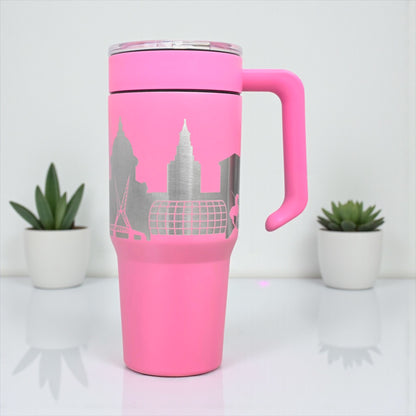 Pink Oklahoma City Skyline 30oz tumbler with handle and laser-engraved stainless design, stylish OKC souvenir by The Curious Bison.