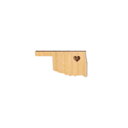 Oklahoma heart wooden lapel pin showing state shape with engraved heart detail, laser cut wood pin used as Oklahoma souvenir or state pride accessory