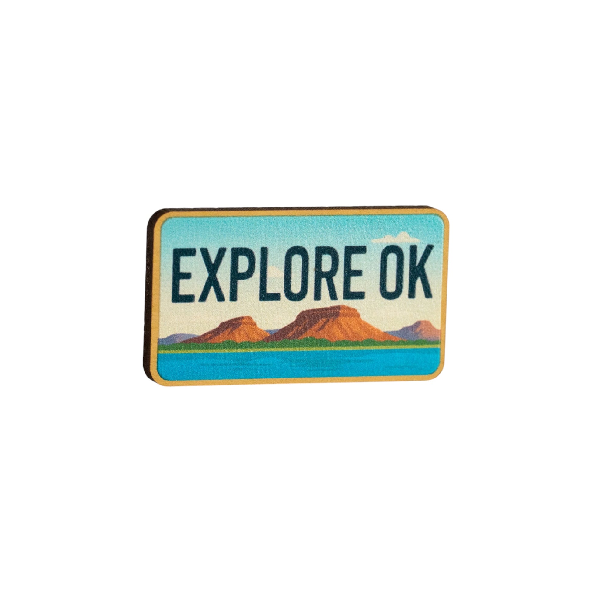 Explore OK Oklahoma lapel pin isolated on white background showing colorful scenic landscape design and rectangular souvenir pin shape