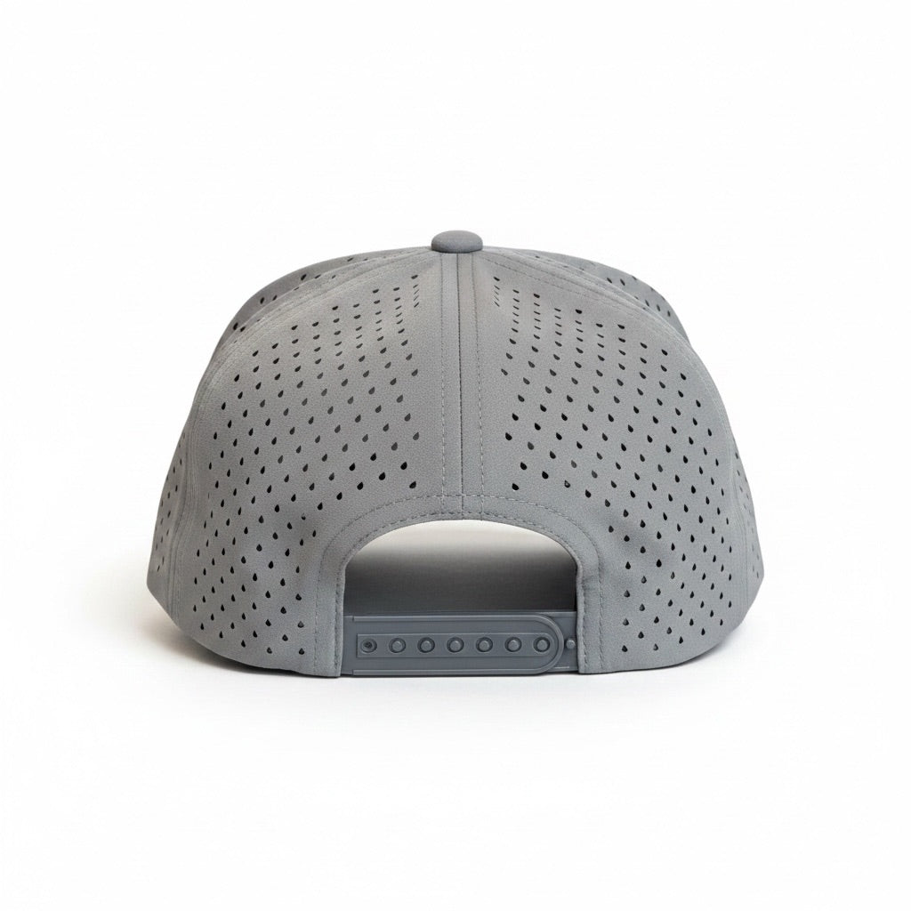 Rear view of gray Oklahoma performance golf hat showing laser-perforated side and back panels with adjustable snapback closure for breathable outdoor wear