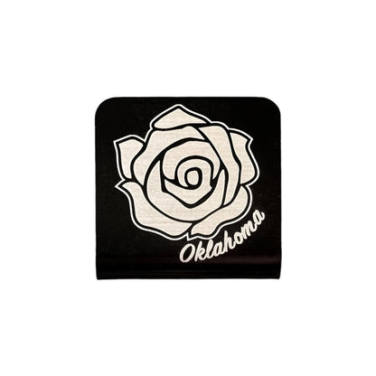 Square aluminum hat clip with laser engraved Oklahoma rose design and Oklahoma script, black powder coated finish with silver metal detail