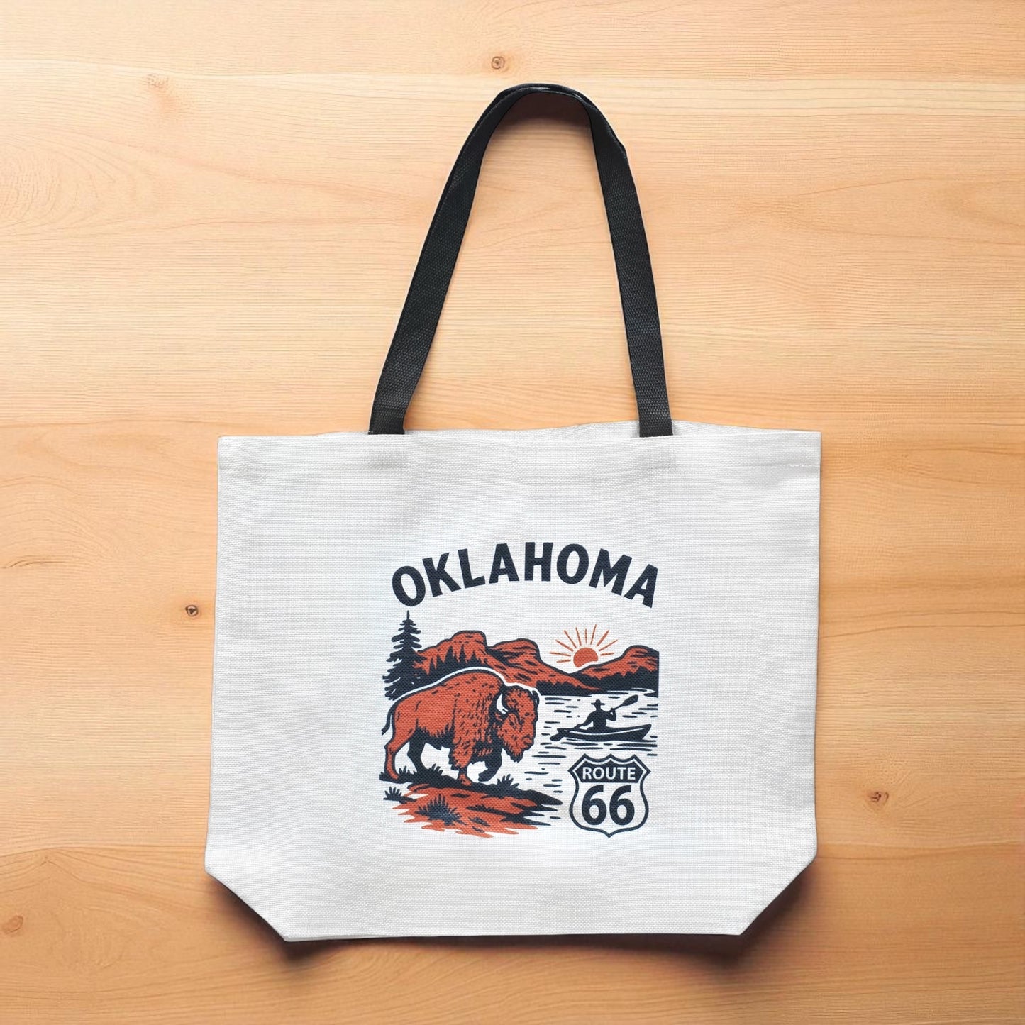 Oklahoma Route 66 bison tote bag displayed on wood surface, reusable travel tote with state pride and Route 66 design