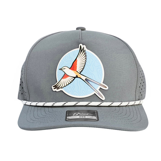 Front view of gray Oklahoma scissortail performance golf hat with full-color state bird patch, rope detail, structured crown, and laser-perforated ventilation panels