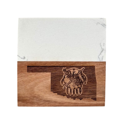 Marble and acacia wood coaster engraved with Oklahoma state outline, Scissortail Flycatcher, and rose details, photographed on white background.