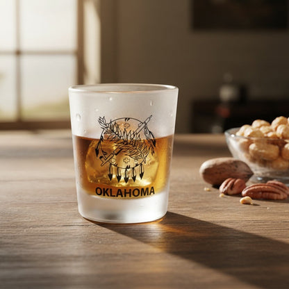 Frosted 8 oz Oklahoma whiskey glass filled with bourbon on a wooden table, featuring Oklahoma state flag inspired artwork for home bars, whiskey lovers, and Oklahoma souvenir collections.