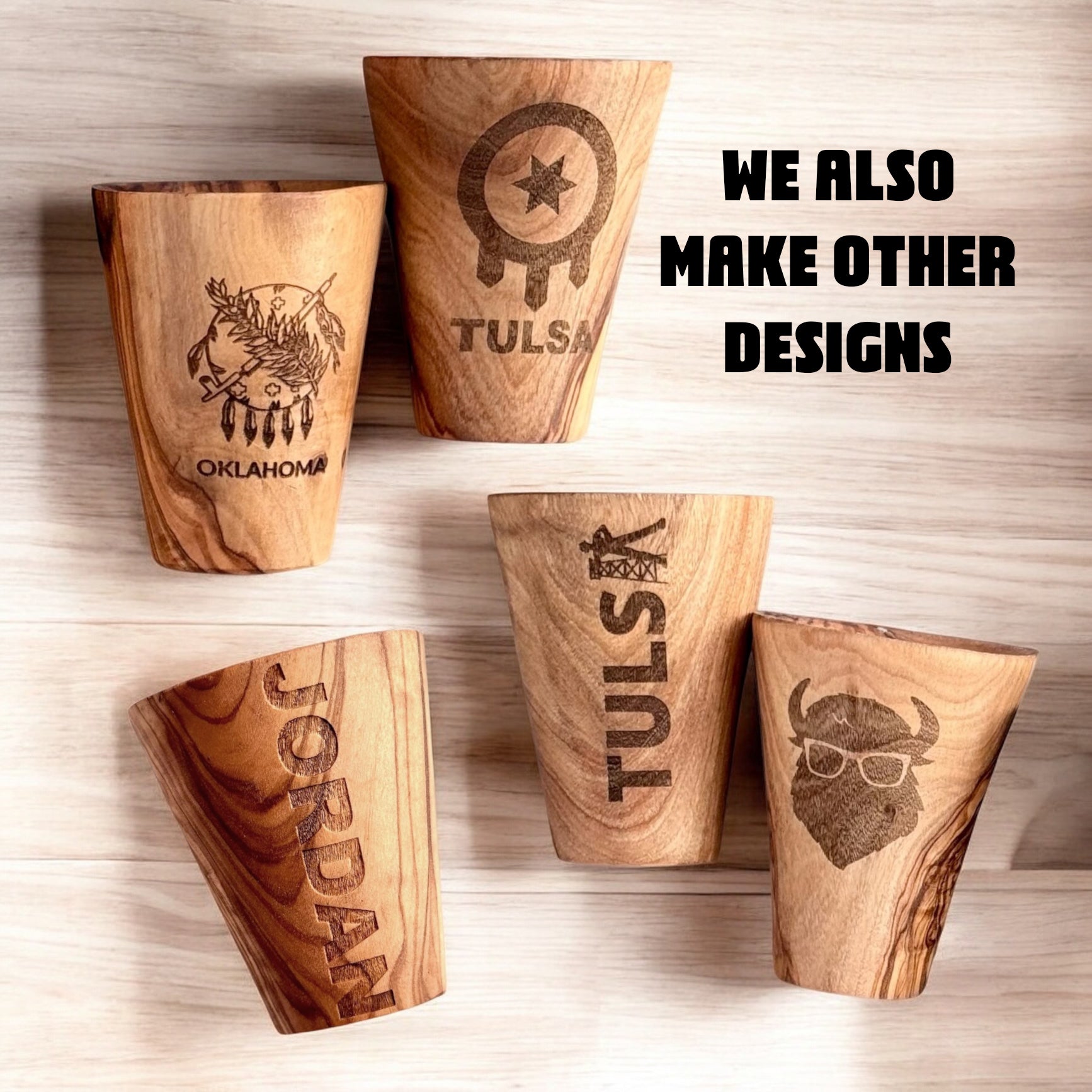 Collection of olive wood shot glasses with different engraved Tulsa and Oklahoma designs, handmade wood shot glasses