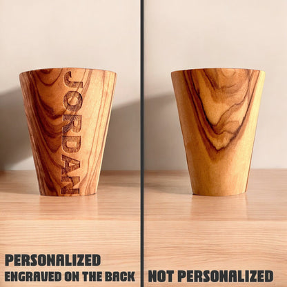 Comparison of personalized and non personalized olive wood shot glass showing engraved name option on back
