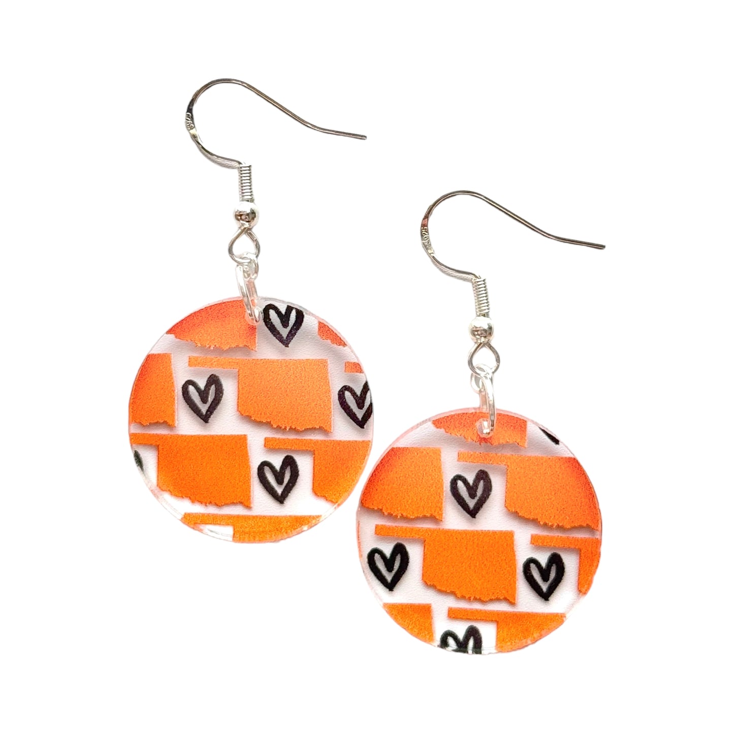 Round Orange Oklahoma acrylic earrings on white background showing printed Oklahoma state outline pattern with hearts, hypoallergenic hooks and lightweight design